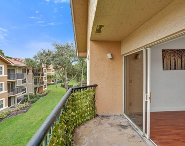 8761 Wiles Road - Photo Thumbnail 16