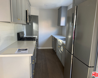 1703 1/2 S Burlington Avenue - Photo Thumbnail 15