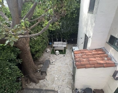 8210 Willoughby Avenue - Photo Thumbnail 4
