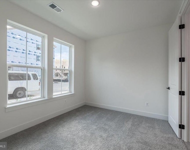 9211 Forkleaf Oak Drive - Photo Thumbnail 3