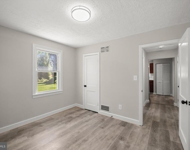 7520 Burgess Lane - Photo Thumbnail 5
