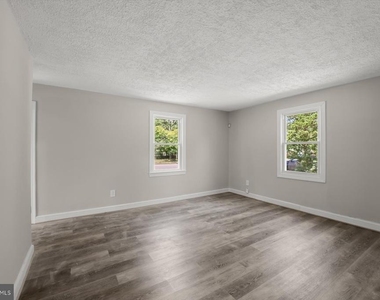 7520 Burgess Lane - Photo Thumbnail 1