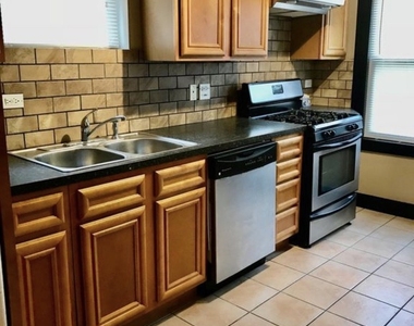 6642 S Troy Street - Photo Thumbnail 3