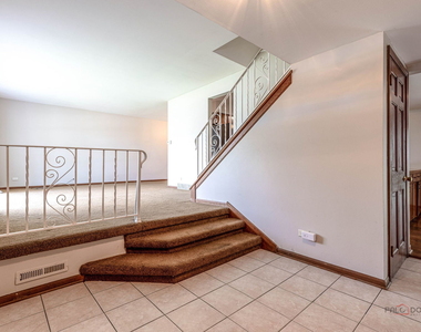 928 N Rohlwing Road - Photo Thumbnail 3