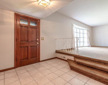 928 N Rohlwing Road - Photo Thumbnail 5