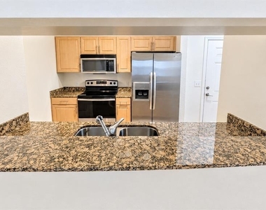 1064 N Tamiami Trail - Photo Thumbnail 3