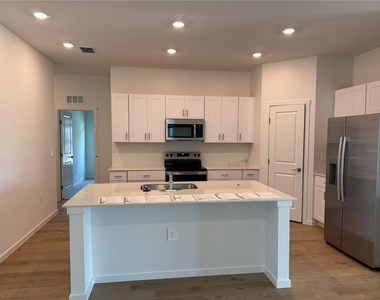 9010 Gulf Shore Terrace - Photo Thumbnail 2