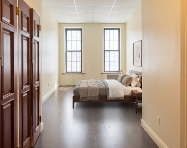 213 East 118th Street - Photo Thumbnail 1