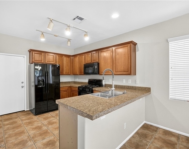 9132 Blue Raven Avenue - Photo Thumbnail 9