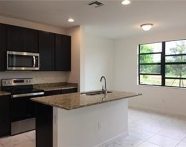 335 Nw 33rd Lane - Photo Thumbnail 1