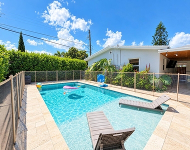 7610 S Olive Avenue - Photo Thumbnail 3