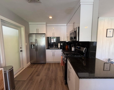 7610 S Olive Avenue - Photo Thumbnail 14