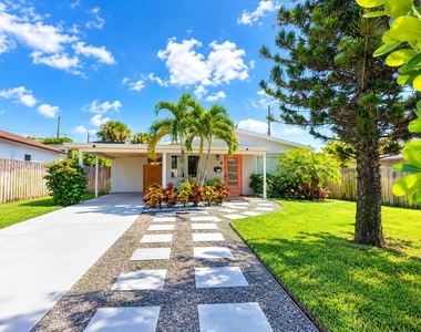 7610 S Olive Avenue - Photo Thumbnail 1