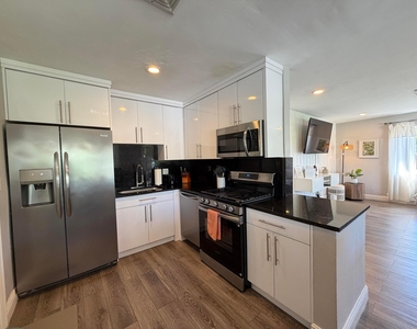 7610 S Olive Avenue - Photo Thumbnail 12