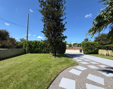 7610 S Olive Avenue - Photo Thumbnail 8
