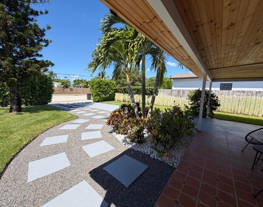 7610 S Olive Avenue - Photo Thumbnail 7