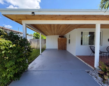 7610 S Olive Avenue - Photo Thumbnail 6