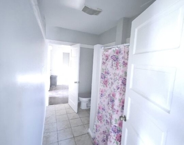 2934 1/2 S Normandie Avenue - Photo Thumbnail 17