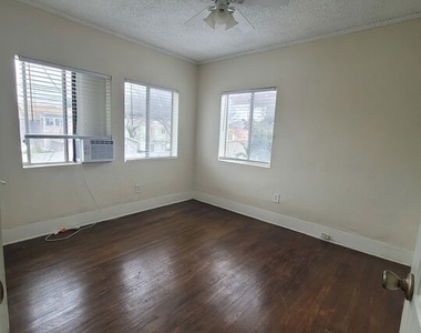 2934 1/2 S Normandie Avenue - Photo Thumbnail 1
