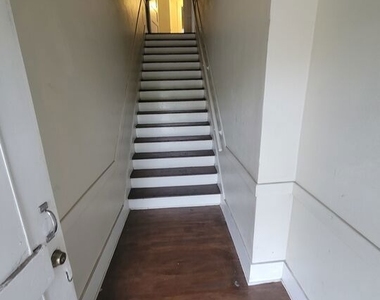 2932 1/2 S Normandie Avenue - Photo Thumbnail 2