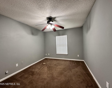 9007 Bridgecreek Drive W - Photo Thumbnail 6