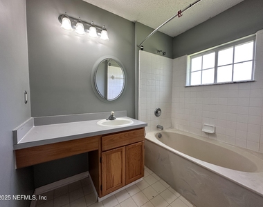 9007 Bridgecreek Drive W - Photo Thumbnail 9