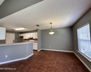 9007 Bridgecreek Drive W - Photo Thumbnail 2