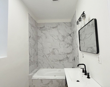 4829 S Champlain Avenue - Photo Thumbnail 5