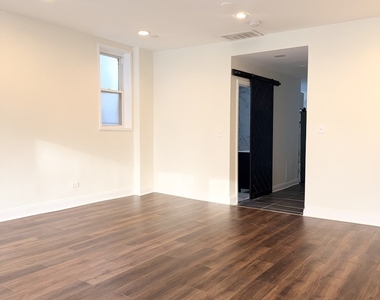 4829 S Champlain Avenue - Photo Thumbnail 2