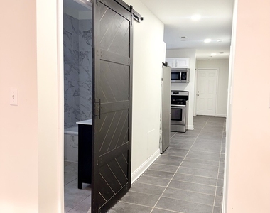 4829 S Champlain Avenue - Photo Thumbnail 4