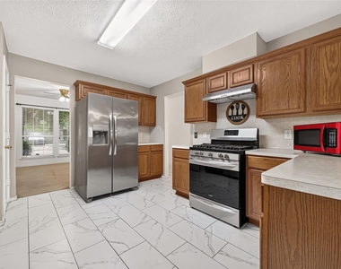 10902 Primrose Acres Lane - Photo Thumbnail 18
