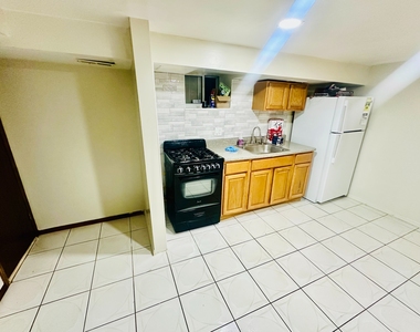 1563 East 46th Street - Photo Thumbnail 1