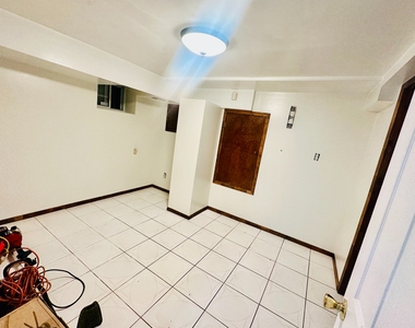 1563 East 46th Street - Photo Thumbnail 2