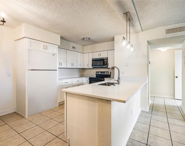 13545 Eagle Ridge Drive - Photo Thumbnail 5