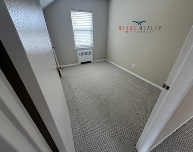 13-12 141st Street - Photo Thumbnail 8