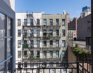 West 53 Street - Photo Thumbnail 5