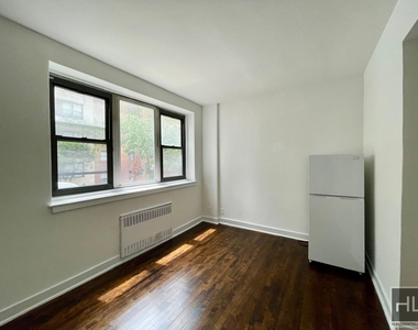 East 61 Street - Photo Thumbnail 1