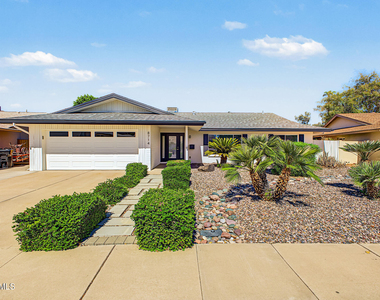 8714 E Clarendon Avenue - Photo Thumbnail 1