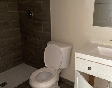 304 Nw 30th Court - Photo Thumbnail 3