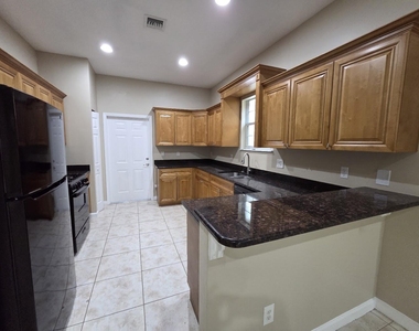 4321 Coquina Winds Way - Photo Thumbnail 7