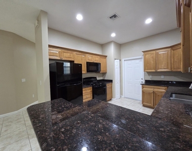 4321 Coquina Winds Way - Photo Thumbnail 9