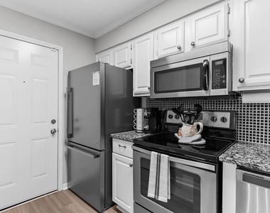 8545 Midpark Road - Photo Thumbnail 8