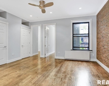 W 50th St - Photo Thumbnail 5