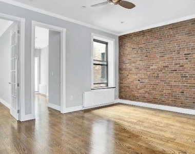 W 50th St - Photo Thumbnail 4