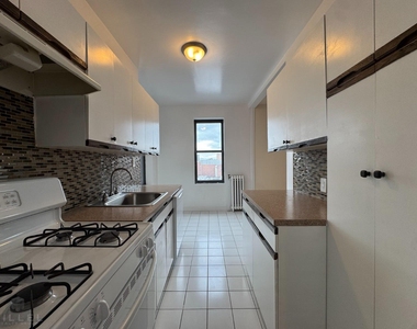36-14 165th St - Photo Thumbnail 2