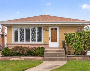 8632 W Ainslie Street - Photo Thumbnail 1