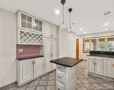 8632 W Ainslie Street - Photo Thumbnail 3