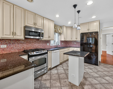 8632 W Ainslie Street - Photo Thumbnail 2