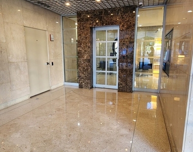 555 W Cornelia Avenue - Photo Thumbnail 3