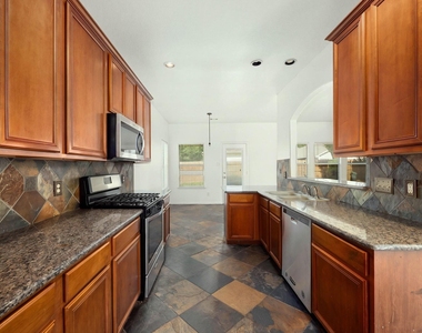 10003 Lynette Falls Drive - Photo Thumbnail 16